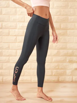 Solid Black Absolute Fit Yoga Tights with Logo Print